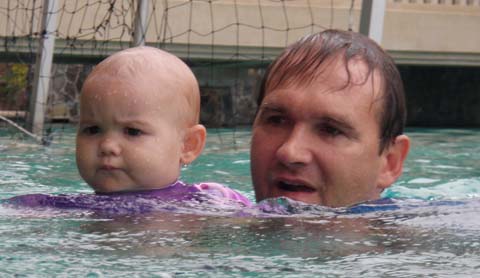 with dad in the pool