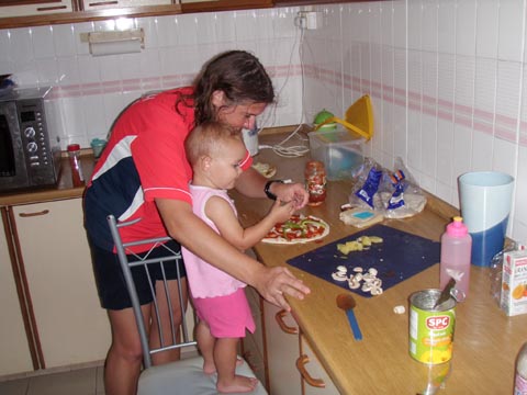 Helping mum mae pizza